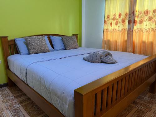 Katil atau katil-katil dalam bilik di Tassana House