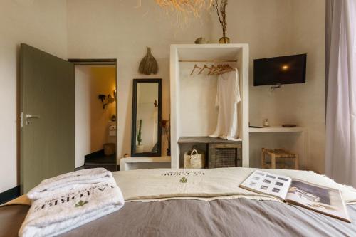 Letto o letti in una camera di la torre boutique rooms