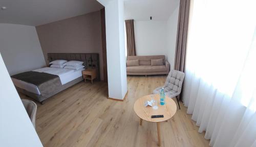 Voodi või voodid majutusasutuse SIBB Hotel toas