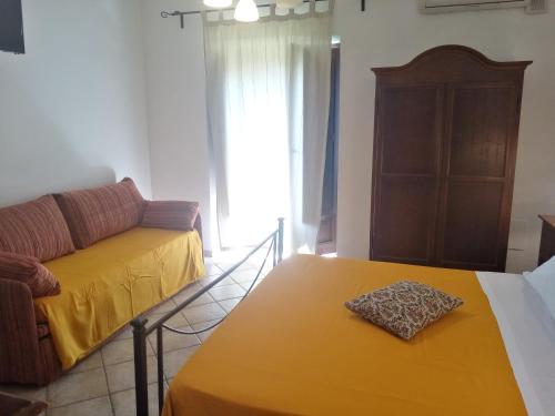 a living room with a couch and a table at Hotel Pace in Pompei