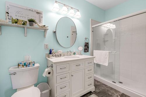 a bathroom with a toilet and a sink and a shower at Villas at Bay Crossing --- 34682 Villa Cir, Unit #4105 in Lewes