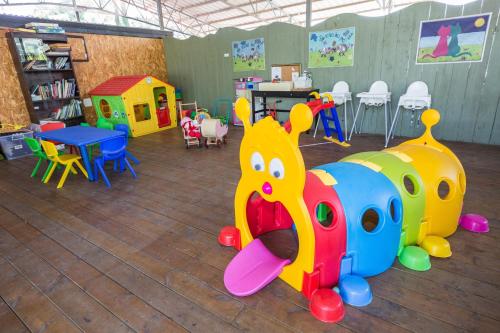 a room with many different types of play equipment at Sea of Galilee Panoramic View in Moshav Ramot