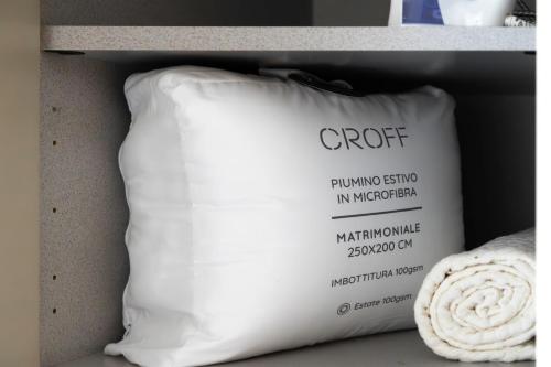 a pillow on a shelf with a price tag on it at Ice Apartment - Free Wifi & Parking in Quartu SantʼElena