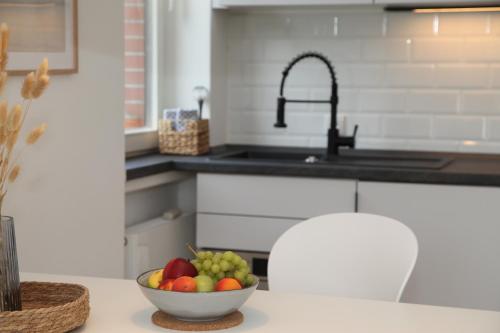 Η κουζίνα ή μικρή κουζίνα στο Apartment Am Teich
