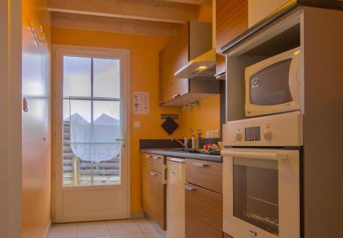 Η κουζίνα ή μικρή κουζίνα στο Atlantic Residence