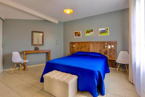 Ένα ή περισσότερα κρεβάτια σε δωμάτιο στο Atlantic Residence
