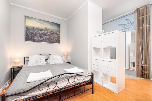 Postel nebo postele na pokoji v ubytování Bluszczańska 74 by Homeprime