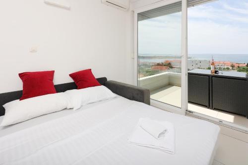 Postel nebo postele na pokoji v ubytování Residences Bellavista 2