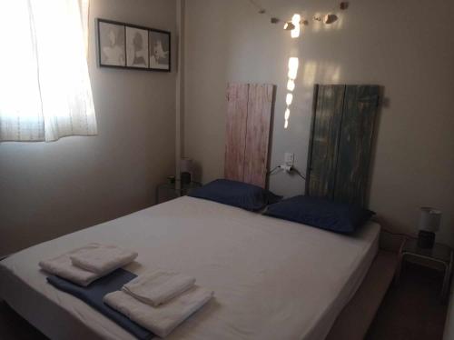 Llit o llits en una habitació de Seaside resort- kallithea