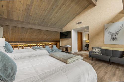a large bedroom with two beds and a couch at Tamarron Lodge 752 & 753 in Durango