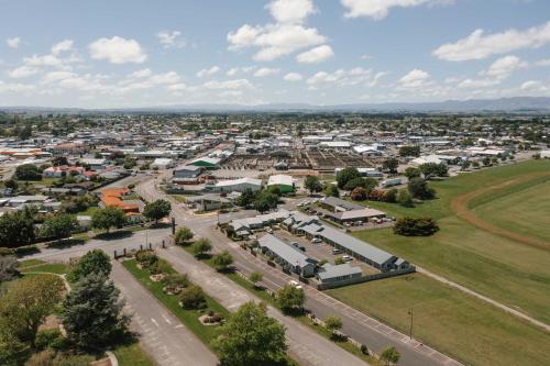 an aerial view of a small town at South Street West Motel in Feilding