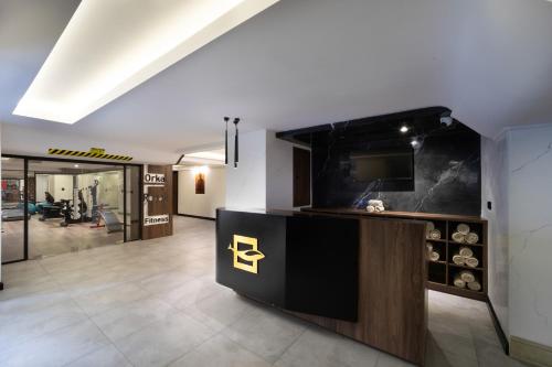 a lobby with a reception desk in a building at Orka Royal Hotel & Spa in Istanbul