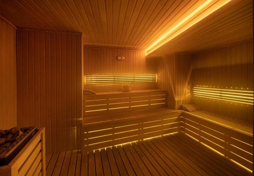 a wooden sauna with a light on the inside at Orka Royal Hotel & Spa in Istanbul