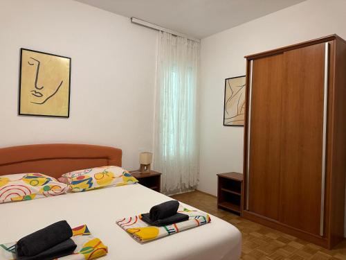 Un pat sau paturi într-o cameră la Apartment Jelić