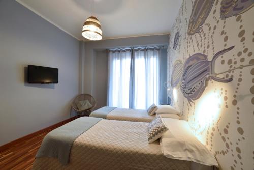 Una cama o camas en una habitación de Hotel Bristol