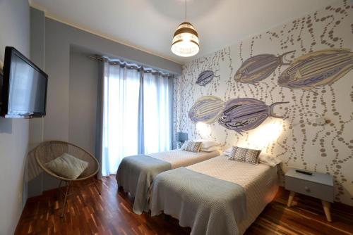 Una cama o camas en una habitación de Hotel Bristol