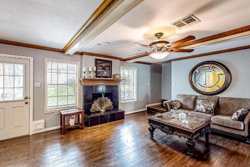 a living room with a couch and a fireplace at Sunstone Vista in Westfield