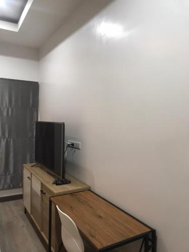 TV a/nebo společenská místnost v ubytování ONE DD HOMES