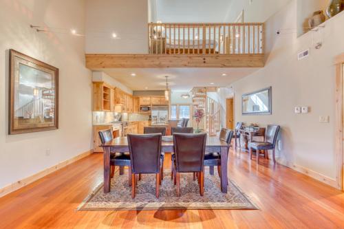 a dining room and kitchen with a table and chairs at #404 Grand Lodge South Penthouse in Government Camp
