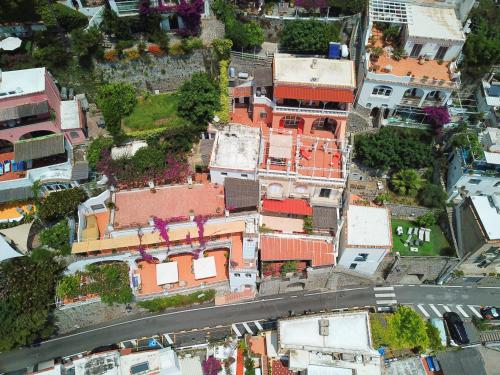 an aerial view of a city with buildings at Villa Sunshine Positano Room in Positano