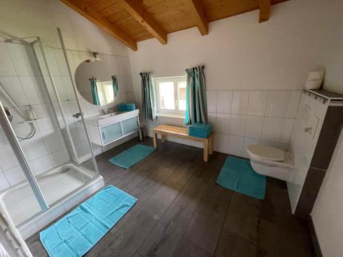 an overhead view of a bathroom with a shower and a toilet at Ferienhaus Altenmarkt, Kaulfersch in Altenmarkt im Pongau