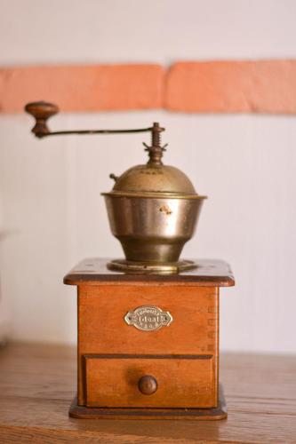 a mortar and pestle sitting on top of a table at Sirbi House in Tallinn