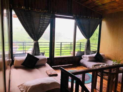 Postel nebo postele na pokoji v ubytování Sapa Plum Eco House