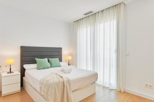 Posteľ alebo postele v izbe v ubytovaní Holidays Elite