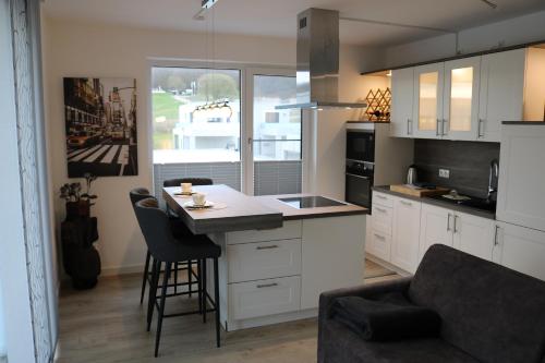 Kuchyň nebo kuchyňský kout v ubytování Villa am Schloss Ranzow - Penthouse Tee 9