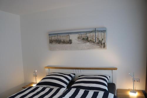 Postel nebo postele na pokoji v ubytování Villa am Schloss Ranzow - Penthouse Tee 9