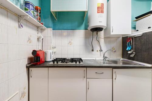 Kitchen o kitchenette sa Soares Beach Apartment