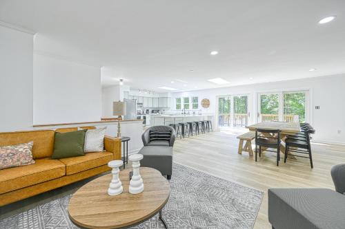 a living room with a couch and a table at Lake it to the Limit in Bumpass