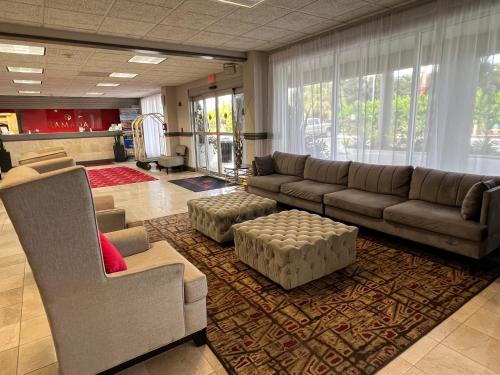 a large living room with a couch and a rug at Marina Vibes - Sarasota in Sarasota