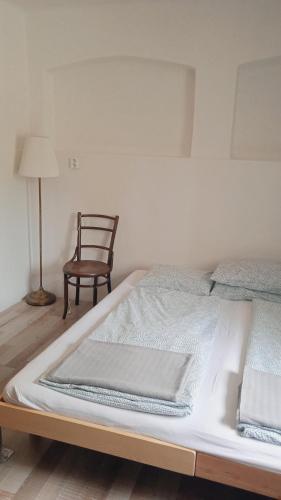Postel nebo postele na pokoji v ubytování Chalupa Malá Turná