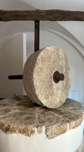 a large rock sitting on top of a table at PALAZZO SAN ROCCO in Sperlonga