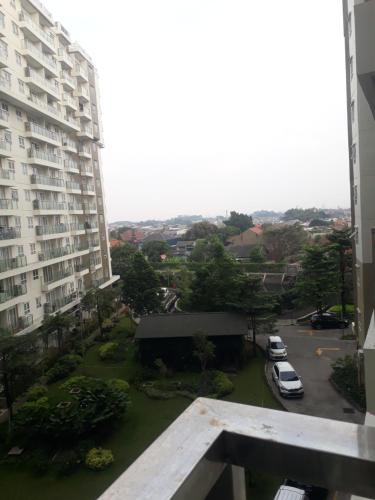 a view from the balcony of a apartment building at Gateway In pasteur in Bandung