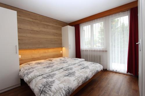 Postel nebo postele na pokoji v ubytování Haus Primavera