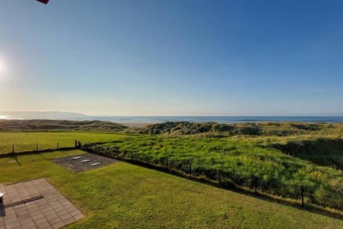 an aerial view of the ocean from a house at Sandy Feet Retreat - Castlerock in Castlerock