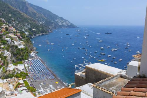 a view of a harbor with boats in the water at Estate4home- La casa del Maresciallo in Positano