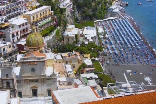 an aerial view of a city with a harbor at Estate4home- La casa del Maresciallo in Positano