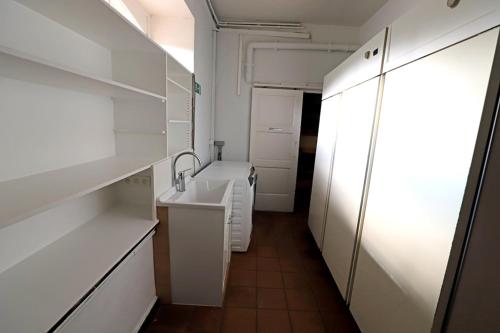 Η κουζίνα ή μικρή κουζίνα στο Domaine "Le Ry d'Ave"