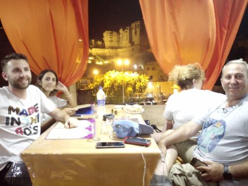 a group of people sitting around a table at Hotel Fort View -The Heart of city in Jaisalmer