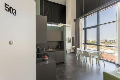 Dapur atau dapur kecil di HTM Venice Suite by Halldis
