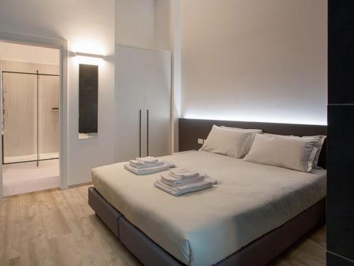 Katil atau katil-katil dalam bilik di HTM Venice Suite by Halldis