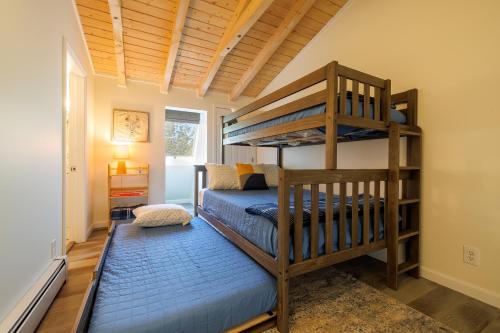 a bunk bed in a room with a bunk beduteneway at Top Floor Condo w/ Ocean Views [Admirals Quarters] in Southwest Harbor