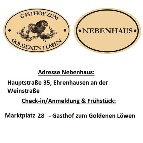dos etiquetas para una moneda de desafío de Newfoundland y Labrador Retriever en Gasthof zum Goldenen Löwen - Nebenhaus, en Ehrenhausen