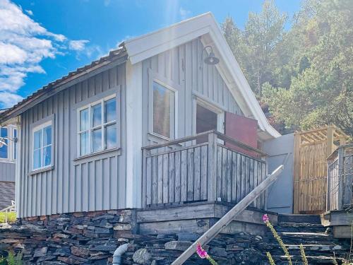 a house sitting on top of a stone wall at 2 person holiday home in kode-By Traum in Kode