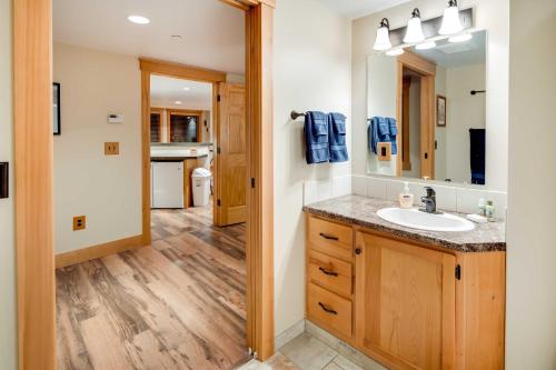 a bathroom with a sink and a mirror at Ketchikan Apt - Walk to Refuge Cove Beach! in Ketchikan