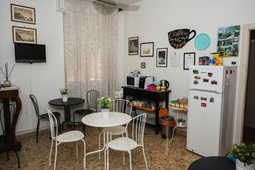 Una televisión o centro de entretenimiento en B&B Pisaland