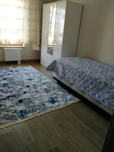 Postel nebo postele na pokoji v ubytování Cevahir turizm